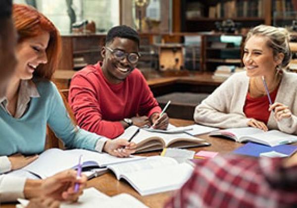 students meeting at table